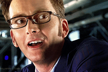 The Tenth Doctor close up wearing specs